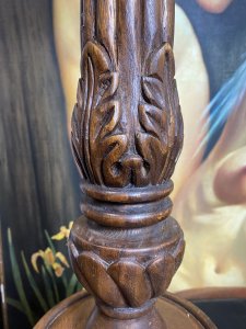 19th Century Large Pair Of Gothic Carved Walnut Tripod Candle Stands. Circa - 1865 Composition- Solid Walnut Condition- Lovely Used A Pair Of Solid Walnut Hand Carved Candles Stands With Shell Top Housing For Large Wax Candle With Decorative Pillar Enriched In Acanthus Leaf Motifs, Standing Upon Solid Tripod Plinth Bases. Beautiful Addition To Gothic Manor. Lovely For Next To An Elaborate Fireplace, Hallway Or Dining Area. Although These Are Being Sold As A Pair They Both Varies Slightly In Design. Please See Images Before Purchase. Provenance Purchased From Country Manor In The Scottish Highlands. Now Part Of Lord Hill Museum Private Collection. Dimensions In Inches Height 29.5” Top Housing Width 9” Tripod Base Width 10”