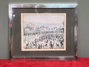 L S Lowry 'The Fairground 1949' Framed Lithograph Print Circa - 1950-1959 Composition - Printed Lithograph On Vellum Brief Artist History Laurence Stephen Lowry 1887-1976 Born into a middle class family and raised in the leafy outskirts of Manchester. Lowrys famous for painting scenes of life in in industrial districts of the North West Of England, where he lived and worked for more than 40 years. He developed a distinctive style of Nieve painting and is best known for his urban landscapes with multiple figures referred to as "Matchstick men". Lowry was never a full time artist. In his early 20's he took a job as a rent collector, and this would be his primary trade for four decades. Although Lowry painted most days after work, Often late into the night, and firmly rejected the term 'Sunday Painter' Remarking 'I'm a Sunday painter that paints every day of the week!" Lowry never adopted a impressionist colour palette and claimed to use five colours vermillion, ivory black, Prussian blue, yellow ochre and flake white. A large collection of Lowrys artworks are on permanent display in 'The Lowry Art Gallery' Salford Quays, named in his honour. Listing Description Original Lithograph of L S Lowry Titled 'The Fairground 1949' Showcasing A Exciting View Of The Fun Fair With Bright Iconic Stalls With Big Top Roofs. A Gathering Of Stalls Of Various Shapes And Sizes Set Amongst A Backdrop Of Blurred Grey Hills With The Shadow Of Factory Buildings. Huge Crowd With Hundreds Of Figures In An Array Of Poses Relevant to The Fairground Celebration. Wonderful Composition By Exceptional British Artist L S LOWRY. A Lithograph Print On Vellum Set Inside Original Glazed Chrome Frame. Dimensions In Inches Height 10.5" X Width 12 3/4" For Further information Please Call 07707488566 Thank-you