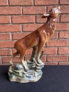 Rare Art Deco Lustreware Large Deer Figurine ByJema Holland Foundry Mold No25. Circa - 1930’s Composition- Lustre Glazed Ceramic Large Art Deco Ceramic Lustreware Figurine Of A Posed Calling Deer Set Upon Rock Face. Stunning Facial Details With Delicate Legs And Textural Base. Marked Underside Jema Holland No 25. The Jema Holland Foundry Was Founded In 1942 And Ceased To Trade In 1994. This Is Thought To Be An Early Piece. Condition- Pristine Antique There Are Two Holes In The Head Were Horns Once Stood. Dimensions In inches Height 17” Width 10” Depth 5.5”