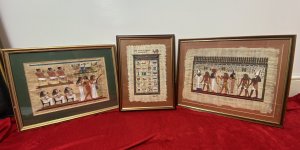 Trio Of Egyptian Hieroglyphic Artworks On Papyrus Set In Glazed Frames Circa - Vintage Composition - Hand Painted Papyrus Listing Description Trio Of Three Hand Painted/ Signed Artworks Of Egyptian Figures And Hieroglyphics On Papyrus Paper Set In Glazed Mahogany Frames. The Central Artwork Displaying The Hieroglyphic Alphabet In Full Colour, Signed By Artist. The Left Scripture Titled 'Tomb Of Nakht' Egypt, Dynasty XVIII 1450 B.C. Depicts Three Main Female Figures Playing Musical Instruments Including The Harp And Flute, With Sitting Male And Females Holding Sceptres. The Third Artwork With Unknown Title Displays Severn Intricately Painted Egyptian Figures One Thought To Be The Pharaoh With Over Head Hieroglyphic Scripture. All Artworks Are Signed By The Artist. Dimensions In Inches Hieroglyphic Alphabet Height 18 1/4" x width 14" Tomb Of Nakht Height 16" x Width 20" Pharaoh Height 17" x Width 20.5"