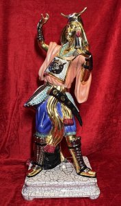 Italian Venetian Bassano Japanese Samurai Warrior Showpiece Circa - 20th Century Composition - Porcelain Brief History Of Bassano Ceramics Nove Bassano Artistic Ceramics Is The Most Famous Of Brands. The Ancient Factory In The Centre Of Nove, A Small Venetian Town On The Right Bank Of The River Brenta, 7 Kilometres From Bassano Del Grappa Stands The Old Factory Of Artistic Ceramics. The Town Of Love Is Internationally Known For Its Artistic Manufacturing Of Italian Ceramics. Dating Back To 1685 A Document Speaks Of Giovanni Bassista Antonibon, A Ceramicist And His Family Had Started The Production Of Majolica In Collaboration With Francesco Parolin. It Is These Familys Whom Carry Out The Tradition Of Quality Italian Ceramics Today. Countless Ceramics Produced In This Factory Are One Show Today In Museums, Embassies, Royal Houses And Private Collections. Listing Description Large Sculptural Showpiece Of Japanese Samurai Warrior With Metallic Gold Gilded Distinctive Japanese Facial Features And Limbs. Large Horned Kaboto Helmet Sits Upon The Warriors Head With Ornamental Earrings. Both Posed Hands Would Of Originally Been Baring A Samurai Sword. Oversized Peach Kimono Tunic With Central Horned Animal Head Motif, Vibrant Blue Pantaloon Trouser With Over Skirt And Samurai Holster. High Gilt Padded Front Boots. Set Upon Marbleised Plinth Base And Stamped On Base By Maker BASSANO. Rare Collectors Figurative Samurai Warrior Museum Grade Showpiece. Condition - Excellent Showing Minor Damage To Helmet Please See Pictures And Samurai Sword Missing. Minor Faults Conducive To Age Of Showpiece. Dimensions In Inches Height 26" Base Width 10.5" X Depth 9"