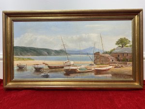 Sailing Boats In The Bay During Low Tide Oil On Canvas By James Horne Circa - Vintage Composition - Oil On Canvas Listing Description Wonderful Oil On Canvas Composition By Known Artist James Horne. This Painting Is Comprised Of Twelve Sailing/ Fishing Boats Tethered Up In Front Of Sandy Headland With Sandstone Barn Buildings. Some Boats Are Set On Stands Whilst Others Lay On The Sea Bed In A Cornish Bay During Low Tide. Wonderful Perspective With Mountainous Background, A Finely Painted Array Of Different Vessels Including Rowing Boat, Larger Fishing Vessels And Masted Sailing Boats. Clear Waters With Intricately Painted Reflections Showing In-depth Knowledge And Fine Quality Of This Artists Work. Stunning Composition, A Collectors Artwork. Set In Gilt Frame And Signed By Artist James Horne. Dimensions In Inches Height 16" Width 28 1/4" Condition - Very Good Small Tear In Canvas Due to Age Please See Images