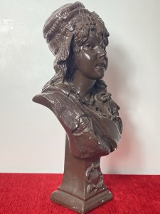 Large French Art Deco Classical Bohemian Gypsy Woman Chalk-ware Bust Circa - 1930's Composition - Overpainted Chalkware Art Deco Detailed Bust Of Bohemian Gypsy Woman With Elaborate Headdress Embellished With Coins And Tassels. Long Platted Hair With Large Bow, Oversized Segmented Necklace With Pendant And Tambourine Inside Her Jacket Pocket. Facial Feature In Fabulous Detail With Large Eyes And Beaming Smile. Standing On Tapered Classical Plinth With Scroll Decoration. Condition - Antique Used Overall Lovely. Signs Of Wear Smalls Scuffs To Paintwork Due To Age. Dimensions In Inches Height 19.5" Width 10" Depth 7" Base 4 1/2" X 4 1/4"