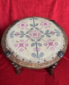 William and Mary Style Stool With Turned Stretchers & Needlepoint Seat Circa - 1910 Composition - Ash Wood Listing Description Fine Country William And Mary Style Footstool With Turned Baluster Spindle Legs And Support Stretchers Set Upon Carved Lyre Feet. Decorative Circular Seat With Needlepoint Tapestry Cover In Floral Pink, Green And Gold Pattern, Set Inside Carved Egg And Dart Boarder. Dimensions In Cms Height 41cm X Width 47cm