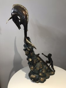Vintage 20th Century Quality Bronze Statue Merlin Fish & Fishing Boat Capsized With Gilded Rock Supporting The Elaborate Merlin Fish On The Top Showpiece Excellent Detail To The Sculpture Fisherman’s Face Impeccably Executed Wonderful Collectors Rare Statement Antique Look Bronze Statue Signed By Artist On Side Of Fishing Boat Weight Approx 15Kg Dimension In Inches Height 34” Width 15” Depth 11”