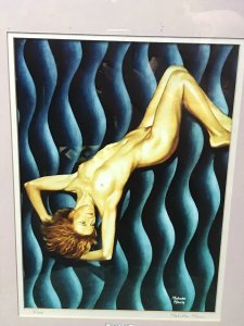 Contemporary Signed Proof 1/200 Titled Wavy Navy Nude Portrait By Malcolm Morris Title - Wavy Navy Artist - Malcolm Morris Signed Lithograph Of Original Contemporary Watercolour Nude Painting By Artist Malcolm Morris Proof Number 1 Of 200 By Renowned Welsh Artist Contemporary Unusual Wavy Background In Vivid Blue Hues With Posed Nude Muse With Fine Detail Very Well Executed Nude Lithograph Portrait Set In Glazed Wooden Frame Dimensions In Inches Height 24” Width 18.5”