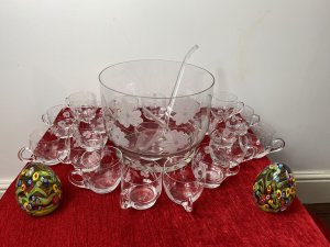 Exquisite Floral French Chantilly Cut Glass Punch Bowl Set. Composition- Crystal Glass Large Glass Punch Bowl Decorated With Beautiful Floral Vine With Large Glass Ladle To Serve Beverages. Complete With Hand Etched Cups With Shaped Handles In Two Different Variation Of Shapes And Floral Etchings. Exceptionally Fine Quality And Delicate Set Total 18pcs Stunning Set For Garden Party Or Soirèe Dimensions In Inches Punch Bowl Height Width Cup Height Width