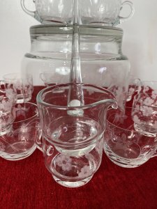 Exquisite Floral French Chantilly Cut Glass Punch Bowl Set. Composition- Crystal Glass Large Glass Punch Bowl Decorated With Beautiful Floral Vine With Large Glass Ladle To Serve Beverages. Complete With Hand Etched Cups With Shaped Handles In Two Different Variation Of Shapes And Floral Etchings. Exceptionally Fine Quality And Delicate Set Total 18pcs Stunning Set For Garden Party Or Soirèe Dimensions In Inches Punch Bowl Height Width Cup Height Width