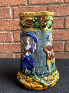 Large Minton Majolica Style Pitcher Jug With Dancing Maidens & Jesters Decoration. Circa - Vintage Reproduction Composition - Glazed Pottery/ Earthenware Beautiful Large Vibrant Glazed Pouring Jug In The Minton Majolica Style. This Design Is Typical Of Minton During The Late 19th Century. A Large Vine Like Structure Makes Up The Shaped Handle Which Entwines The Top & Bottom Edge Of The Jug With Sprays Of Grapes And Leaves. The Central Portion Of The Jug Has Large Relief Figures Of Maidens And Jesters Lavishly Posed Dancing. Very Decorative And Useable Piece. Condition- Used Vintage No Damage Lovely Condition. Dimensions In Cms Height 24.5cms Width 23cms Depth 11.5cms (top)