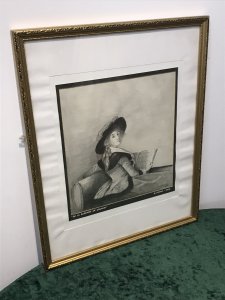 20th Century Artwork De La Barrone De Crussol Pencil And Charcoal Drawing Signed By Artist Elizabeth E Cooke and Dated 1978 Original Artwork In The Musee De Augustins Toulouse Original Artwork Dated 1785 Painted By Elizabeth Louise Vigèe Le Brun ( Famous Painter Of The Period Whom Also Painted Marie Antoinette) Pencil And Charcoal Half Portrait Drawing Of The Barrone De Crussol Florensac Whom Turns To Gaze The Viewer Over Her Shoulder. She Holds A Musical Score And Wears A Splendid Red Costume With Deep Black Velvet Collar And Matching Hat (Original In Colour) Little Is Known Of This Woman Of Great Beauty, Elegance And Distinction. Stunning Pencil And Charcoal Drawing Signed By Artist E A Cooke Set In Glazed Gilt Frame Dimensions In Inches Height 21 1/4” Width 17 1/4” Depth 1/2”