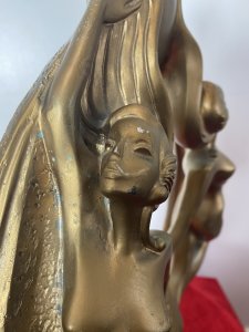 Rare French Empire 1930’s Art Deco Gilt Mascot Sculpture Of Two Nude Nymphs. Breathtaking Design Of The Period Theatrical Posed Pair Of Nude Nymphs Giving The Ultimate Image Of Glamour. Fabulous Shaped Art Deco Period Gilt Designer Sculpture. Beautiful And Iconic Conversation Piece. Provenance Purchased From Nobleman Collector Of Fashion In Paris Now Part Of Extensive Lord Hill Collection Dimensions In Inches Height 19” Width 12” Depth 6”