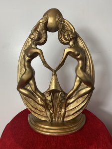 Rare French Empire 1930’s Art Deco Gilt Mascot Sculpture Of Two Nude Nymphs. Breathtaking Design Of The Period Theatrical Posed Pair Of Nude Nymphs Giving The Ultimate Image Of Glamour. Fabulous Shaped Art Deco Period Gilt Designer Sculpture. Beautiful And Iconic Conversation Piece. Provenance Purchased From Nobleman Collector Of Fashion In Paris Now Part Of Extensive Lord Hill Collection Dimensions In Inches Height 19” Width 12” Depth 6”