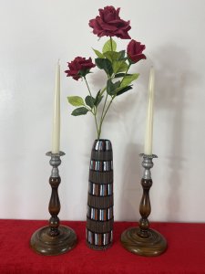 Pair Of Art Deco Mahogany And Pewter Candle Sticks. Circa - 1930's Composition - W00d / Pewter Pair Of Decorative Art Deco Wooden Candle Sticks With Bullion Shaped Bases And Top Mount Candle Holders In Pewter With Acanthus Leaf Pattern. Candles Included Dimensions In Inches Height 10" Base Diameter 5"