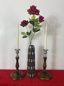 Pair Of Art Deco Mahogany And Pewter Candle Sticks. Circa - 1930's Composition - W00d / Pewter Pair Of Decorative Art Deco Wooden Candle Sticks With Bullion Shaped Bases And Top Mount Candle Holders In Pewter With Acanthus Leaf Pattern. Candles Included Dimensions In Inches Height 10" Base Diameter 5"