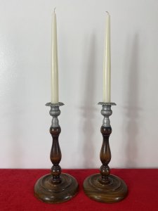 Pair Of Art Deco Mahogany And Pewter Candle Sticks. Circa - 1930's Composition - W00d / Pewter Pair Of Decorative Art Deco Wooden Candle Sticks With Bullion Shaped Bases And Top Mount Candle Holders In Pewter With Acanthus Leaf Pattern. Candles Included Dimensions In Inches Height 10" Base Diameter 5"