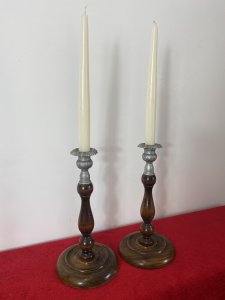 Pair Of Art Deco Mahogany And Pewter Candle Sticks. Circa - 1930's Composition - W00d / Pewter Pair Of Decorative Art Deco Wooden Candle Sticks With Bullion Shaped Bases And Top Mount Candle Holders In Pewter With Acanthus Leaf Pattern. Candles Included Dimensions In Inches Height 10" Base Diameter 5"