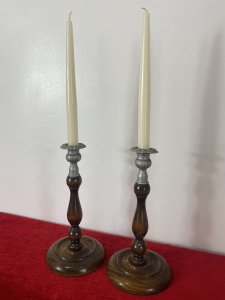 Pair Of Art Deco Mahogany And Pewter Candle Sticks. Circa - 1930's Composition - W00d / Pewter Pair Of Decorative Art Deco Wooden Candle Sticks With Bullion Shaped Bases And Top Mount Candle Holders In Pewter With Acanthus Leaf Pattern. Candles Included Dimensions In Inches Height 10" Base Diameter 5"