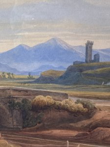 19C Aristocratic Romantic Castle Landscape Watercolour Painting By Lady Buetiau Hepburne. Circa - 1900 Composition - Watercolour On Velum Beautiful Watercolour Of A Romantic Landscape Composition Of Rolling Hills, Castles And Bridge Crossing In Italy With Detailed Flora And Forna. Impressive Coloration In Earth Hues Painted By The Fine Hand Of Aristocrat Lady Buetiau Hepburne Whilst On Vacation In Italy During The 1900. Signed On The Reverse And Set In Glazed Gilt Frame. Dimensions In Inches Height 13 1/4” Width 17 1/4”