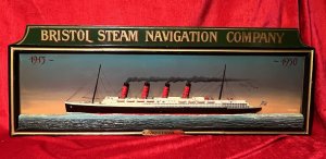 Historic Maritime Memorabilia 'HMS Aquatania' Diorama Wooden Ship Signage Circa - Vintage Composition - Wood Listing Description Large Hand Painted Decorative Ship Memorabilia Signage Plaque Of Historic Ship HMS Aquatania. Rectangular Sinage Plaque Titled 'BRISTOL STEAM NAVIGATION COMPANY' With Central Dioramic Wooden 2D Aquatania Ship Model In Full Sail, With Steam Bellowing from All Four Chimneys. Intricately Detailed Hull With Decks Visible With Windows, Lifeboats And Masts. Dated With Ships Start And End Of Service And Signed By Maker. Painted Movement Of The Sea With Central Base Brass Name Plaque Reads 'AQUATANIA'. Wall Hanging Hooks on Reverse. Lovely Historical Memorabilia Artwork For Martitime Collector/Enthusiast Display In Study, Lounge, Living Area Wall Display. A Truly Fabulous Conversation Piece. Dimensions In Inches Height 16.5" X Width 45"