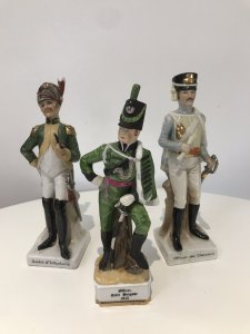 3 Porcelain French Cavelry Officer Figurines Named Figurines 1. Soldat d’Infanteria 2. Officer Rifle Brigade 1815 3. Officer des chasseurs Handmade In French Factory Dated 1930’s Dimensions In Inches 1 H 8.5” W 2.5” 2 H 8.1/4” W 2.1/4” 3 H 8.3/4” W 2.5”