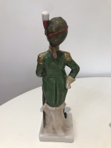 3 Porcelain French Cavelry Officer Figurines Named Figurines 1. Soldat d’Infanteria 2. Officer Rifle Brigade 1815 3. Officer des chasseurs Handmade In French Factory Dated 1930’s Dimensions In Inches 1 H 8.5” W 2.5” 2 H 8.1/4” W 2.1/4” 3 H 8.3/4” W 2.5”