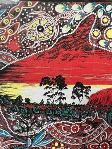 Australian Bulurru Aboriginal Artwork Titled - "NGURA" OUR LAND Artist - TJINTA TJINTA Listing Description Wonderful Vibrant Aboriginal Artwork Of Great Cultural Significance. The Central Portion Of The Artwork Shows The Sacred Uluru/ Ayers Rock, Which Is One of Australias Most Recognised Landmarks. The Rock Is A Colossal Sandstone Formation Standing 348M High, Rising 863M Above Sea Level. Uluru Is Noted for Appearing To Change Colour At Different Times Of the Day, Most Noticeably Glowing Red At Dawn And Sunset. Entwined Around the Artwork Are Native Animals, Including Kangaroos, Snakes, Lizards, Turtles As Well As Native Fruits And Forna. Glazed And Framed Original Artwork. Print On Canvas. Dimensions In Cm Height 48cm X Width 57.5cm