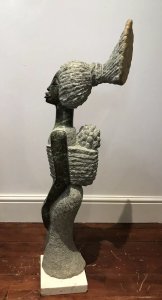 Fine Tall African Marble 20th Century Mother And Child Sculpture By Tendai Mutinhima Wonderful Character Highly Polished Marble Carving Carved From A Solid Piece Of African Marble Very Interesting African Woman With Baby In A Pouch On Her Back Stunning Facial Detail With Long Neck And Arms Signed By Artist Stunning Centre Piece Exceptionally Heavy Approx Weight 90Kg Provenance Purchased From New York Art Gallery Exhibited And Sold 1980’s Brought To London 2019 Dimensions In Inches Height 41” Width 13” (Head) Width 8” (Centre) Depth 7.5”