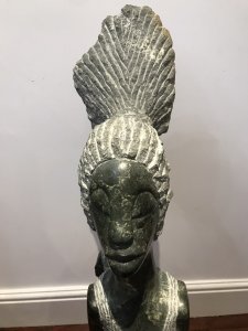 Fine Tall African Marble 20th Century Mother And Child Sculpture By Tendai Mutinhima Wonderful Character Highly Polished Marble Carving Carved From A Solid Piece Of African Marble Very Interesting African Woman With Baby In A Pouch On Her Back Stunning Facial Detail With Long Neck And Arms Signed By Artist Stunning Centre Piece Exceptionally Heavy Approx Weight 90Kg Provenance Purchased From New York Art Gallery Exhibited And Sold 1980’s Brought To London 2019 Dimensions In Inches Height 41” Width 13” (Head) Width 8” (Centre) Depth 7.5”