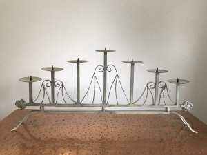 Pair Of Ornate Wrought Iron 7 Branch Candelabras 7 Tiered Candle Holders With Spikes To Secure The Candles As Well As Wax Trays Ornate Wrought Iron Scrolls With Twisted Iron Decorative Spiral Supports With Organic Leaf Ends The Candelabras Stand On Four Ornate Legs Beautiful Vintage Paint Effect Turquoise/Cream Dimensions In Inches Approx Height at highest point 15” Height At Ends 9.5” Width 34” Depth 4”