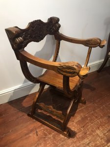 Carved Red Walnut X Frame Green Man Great Hall Chair Hand Carved In Solid Red Walnut Wood With Green Man Face Carvings, Griffins Head Arm Rests And Floral Motifs Carved Arched Stretchers Stunning Quality X Frame Hall Chair Lovely Condition Dimensions In Inches Height 36.5 Seat Height 17” Width 24.5” Depth 20”