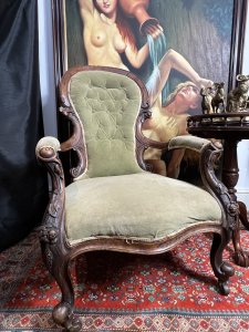 Title - Antique Victorian Balloon Back Armchair Circa 1870 Circa - 1870 Composition - Walnut Frame / Silk Velvet Upholstery -Listing Description - Stunning Antique Balloon Back Armchair With Solid Walnut Frame Ornately Carved With Rose vines And Acanthus Leaves. Elegantly Shaped Deep Buttoned Back Rest In Victorian Balloon Back Shape With Wide Comfortable Seat And Splayed Cushioned Armrests. Cabriole Front Legs With Castors For Ease Of Movement And Splayed Back Legs. Original Silk Velvet Upholstery In Good Order. Showing Expected Signs Of Wear And Colour Fade Due To Age And Usage. Wonderful Fine Quality Armchair For Relaxation In County Setting. Could Be Reupholstered To Fit Into A More Modern Setting. Dimensions In Inches Back Rest Height 38.5" X Seat Height 14" X Width26.5" X Depth 32" For Further information Please Call 07376618513 Thank-you