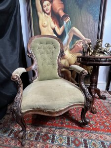 Title - Antique Victorian Balloon Back Armchair Circa 1870 Circa - 1870 Composition - Walnut Frame / Silk Velvet Upholstery -Listing Description - Stunning Antique Balloon Back Armchair With Solid Walnut Frame Ornately Carved With Rose vines And Acanthus Leaves. Elegantly Shaped Deep Buttoned Back Rest In Victorian Balloon Back Shape With Wide Comfortable Seat And Splayed Cushioned Armrests. Cabriole Front Legs With Castors For Ease Of Movement And Splayed Back Legs. Original Silk Velvet Upholstery In Good Order. Showing Expected Signs Of Wear And Colour Fade Due To Age And Usage. Wonderful Fine Quality Armchair For Relaxation In County Setting. Could Be Reupholstered To Fit Into A More Modern Setting. Dimensions In Inches Back Rest Height 38.5" X Seat Height 14" X Width26.5" X Depth 32" For Further information Please Call 07376618513 Thank-you