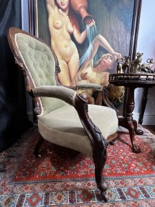 Title - Antique Victorian Balloon Back Armchair Circa 1870 Circa - 1870 Composition - Walnut Frame / Silk Velvet Upholstery -Listing Description - Stunning Antique Balloon Back Armchair With Solid Walnut Frame Ornately Carved With Rose vines And Acanthus Leaves. Elegantly Shaped Deep Buttoned Back Rest In Victorian Balloon Back Shape With Wide Comfortable Seat And Splayed Cushioned Armrests. Cabriole Front Legs With Castors For Ease Of Movement And Splayed Back Legs. Original Silk Velvet Upholstery In Good Order. Showing Expected Signs Of Wear And Colour Fade Due To Age And Usage. Wonderful Fine Quality Armchair For Relaxation In County Setting. Could Be Reupholstered To Fit Into A More Modern Setting. Dimensions In Inches Back Rest Height 38.5" X Seat Height 14" X Width26.5" X Depth 32" For Further information Please Call 07376618513 Thank-you