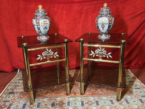 Pair Of Italian Designer Brass Maritime Side Tables With Pearl Inlaid Bouquets. Circa - 1980 Composition - Polished Brass With Smoked Glass Listing Description Pair Of Impressive Italian Designer Polished Brass Maritime Side/Occasional Tables. Square Shape With Smoke Glass Tops And Under Shelves For Storage & Ornament Display. Showcasing Elaborate Front Facing Mother Of Pearl Inlaid Motif Bouquets And Set Upon Four Cylindrical Column Legs. Condition- Excellent Used Minor Scratches Visible to Glass Surface Due To Age And Usage. Dimensions In Inches Height 22” Width 18” SQ