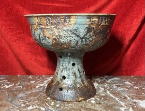 Large Cornish Studio Pottery 'Good Cheer Upon This House' Fruit Bowl Circa - 1970 Composition - Earthenware Listing Description Large Ornamental Studio Pottery Fruit Bowl On Stand. Top Bowl For Holding Fruit Or Decorative Items, Shaped Like A Spherical Cap And Set Upon Tapered Base With Circular Vent Holes. Wonderful Hand Etched Pattern Of Oak Leaves With Entwined Majestical Flowers, With The Top Edge Of The Bowl Reading 'Good Cheer Upon This House' In Scripture Style Text. Fruit Bowl Finished With Rich Kiln Sage Green And Brown Glaze. A Interesting And Very Useful Piece In Pristine Condition. Dimensions in Inches Height 11" X Top Diam 12" For Further Information Please Call The Curator On 07707 488 566 Thank-you.