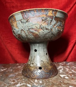 Large Cornish Studio Pottery 'Good Cheer Upon This House' Fruit Bowl Circa - 1970 Composition - Earthenware Listing Description Large Ornamental Studio Pottery Fruit Bowl On Stand. Top Bowl For Holding Fruit Or Decorative Items, Shaped Like A Spherical Cap And Set Upon Tapered Base With Circular Vent Holes. Wonderful Hand Etched Pattern Of Oak Leaves With Entwined Majestical Flowers, With The Top Edge Of The Bowl Reading 'Good Cheer Upon This House' In Scripture Style Text. Fruit Bowl Finished With Rich Kiln Sage Green And Brown Glaze. A Interesting And Very Useful Piece In Pristine Condition. Dimensions in Inches Height 11" X Top Diam 12" For Further Information Please Call The Curator On 07707 488 566 Thank-you.