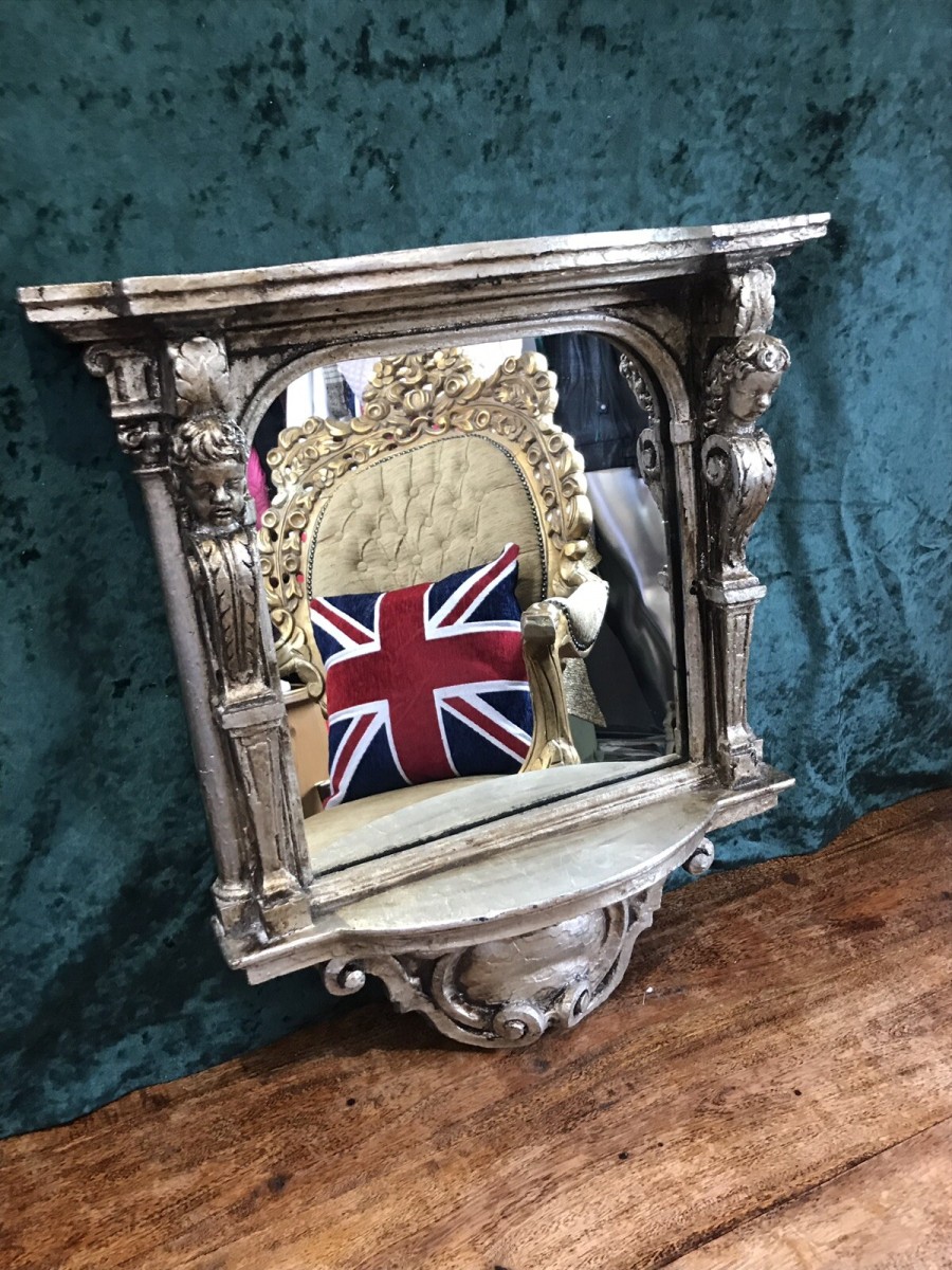 Italian Reproduction Silver Serpentine Shaped Cherub Pier Glass Mirror