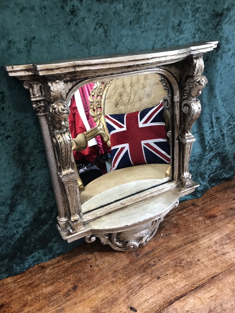 Italian Reproduction Silver Serpentine Shaped Cherub Pier Glass Mirror