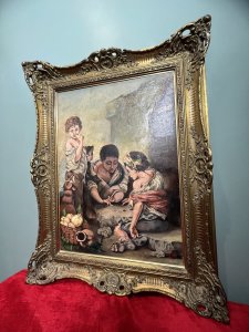 Spanish School Oil Painting After Bartolome Esteban Murillo Titled "Die Kuchenesser" Circa - 20th Century Dated 1979 Composition - Oil On Canvas Artwork Title - ' Peasant Boys Playing Dice' Brief Artist History - Bartolomé Esteban Murillo (December 1617 - April 1682) Spanish Baroque Artist And Youngest Son Of A Family Of 14. Married In 1645 His Wife And Daughter Became The Subjects Of Two Of His Earliest Portraits 'The Virgin Of The Rosary' & Madonna And Child'. His Early Works Combine 16th Century Italian Mannerism And Flemish Realism. The Leading Painter In Seville In The Later 17th Century, He Remained One Of The Most Admired And Popular Of All European Artists In The 18th And Early 19th Centuries. Best Known For Religious Artworks, Murillo Also Produced A Number Of Paintings Of Contemporary Women And Children. These Lively, Realist Portraits Of Flowers Girls, Street Urchins, And Beggars Constituted An Extensive Record Of The Everyday Life Of His Times. Listing Description Original 20th Century Large Spanish School Oil Painting After Spanish Baroque Master Bartolome Esteban Murillo (1617-1682) Fabulous Quality Detailed Street Scene With Three Pheasants Boys. Two Boys Sitting Playing Dice And A Standing Boy Eating Bread With Gazing Dog. Artwork Painted In Fine Brushwork By Accomplished Hand. Signed in Bottom Right Corner Monogrammed CW 1972. Set In Ornate Gilt Wood Frame. Dimensions In Inches Height 35.5" X Width 27.5" For Further Information Please Call 07707 488 566 Thank-you