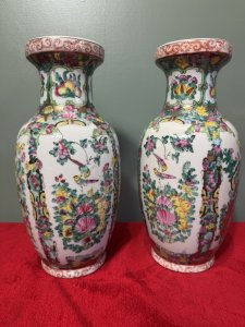 Pair Of Oriental Chinese Qing Style Famille Rose Vases Circa - 1940 Composition - Porcelain Listing Description The Famille Rose Style Defined By Predominantly Pink, White, Yellow And Green Colour Palette, Became Popular In China During The 18th Century And What We Call The 'Qing Dynasty'. The Famille Rose Vases Are Botanical Masterpieces Adorned With Delicate Frames Of Floral Sprays And Bouquets Of Peonies As Well As Many Butterflies And Birds Native To China. A Highly Decorative Pair Of Vases, Delicately Hand Painted In A Lovely Size. Stunning Condition. Dimensions In Cms Height 30.5cm x Width 16cm (Widest Point) X Mouth 10cm/ Base 10cm For Further Information Please Call The Museum Curator On 07707 488566 Thank-you.