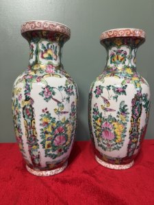 Pair Of Oriental Chinese Qing Style Famille Rose Vases Circa - 1940 Composition - Porcelain Listing Description The Famille Rose Style Defined By Predominantly Pink, White, Yellow And Green Colour Palette, Became Popular In China During The 18th Century And What We Call The 'Qing Dynasty'. The Famille Rose Vases Are Botanical Masterpieces Adorned With Delicate Frames Of Floral Sprays And Bouquets Of Peonies As Well As Many Butterflies And Birds Native To China. A Highly Decorative Pair Of Vases, Delicately Hand Painted In A Lovely Size. Stunning Condition. Dimensions In Cms Height 30.5cm x Width 16cm (Widest Point) X Mouth 10cm/ Base 10cm For Further Information Please Call The Museum Curator On 07707 488566 Thank-you.