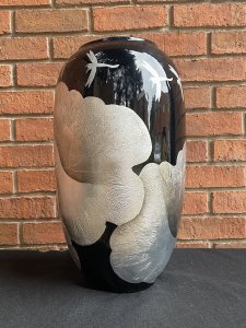 Large Contemporary Black Fire Glazed Vase Decorated With Silver Peony & Dragonflies. Circa - Modern Vintage Composition- Fire Glazed Pottery Stunning Large Bulbous Shaped Black Fire Glazed Centre Piece Vase. Hand Decorated With Embellished Textural Silver Gilt Work Depicting Floral Sprays Of Peonies And Delicate Dragonflies. Condition- Pristine Vintage Dimensions Height 48.5cm Width 27cm (Widest Point) Neck Width 17cm