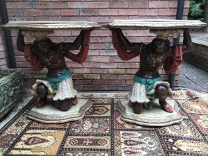 Fine Pair Of Blackamoor Carved Gilt Wood White Marble Top Console Tables Late 19th Century ‘Grand Tour’ Style Wonderfully Carved Details Pluming Feather Headdresses Impeccable Carved Male And Female Pair In Gilt Wood With Glass Eyes Acanthus Leaf Serpentine Shaped Bases Marbled And Guilt Gesso Original Coloured Paintwork Stunning Quality Genuine Period Rare Antique Pair Of Console Tables Dimensions In Inches Height 33.5” Width 33” Depth 17” Weight Approx 50kg Each