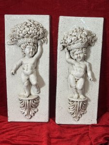Fine Pair Of Marblesque Cherub Plaques With Cracked Glazed Marble Patina Large Pair Of Cherub Plaques, Both Posed Standing Upon Acanthus Leaf Plinth, With Opposite Hands Holding Large Fruit And Floral Bouquet Crowns. Condition - Very Good Antiqued Item, Minor Blemishes And Cracking Visible. Dimensions In Inches Height 27.5" X Width 10 3/4" X Depth 5" For Further Information Please Call Our Museum Curator On 07707 488566 Thank-you.