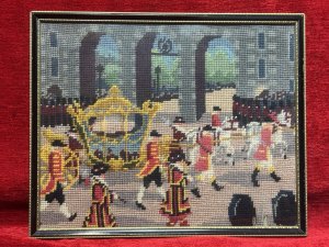 Queen Elizabeth II Coronation Vintage Wool-work Framed Tapestry Circa - 1950 Composition - Wool Thread Embroidery Listing Description Historic Wall Hanging.Hand Embroidered Wool Work Tapestry Depicting Queen Elizabeth II Coronation. Such An Enchanting Artwork Showing The Horse Drawn Coach With The Queen Inside Surrounded By Parading Guards Against Architectural Backdrop. Minor Missing Wool Please See Images. Set In Glazed Frame. Dimensions In Cms Height 28.5cm X Width35cm