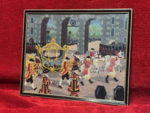 Queen Elizabeth II Coronation Vintage Wool-work Framed Tapestry Circa - 1950 Composition - Wool Thread Embroidery Listing Description Historic Wall Hanging.Hand Embroidered Wool Work Tapestry Depicting Queen Elizabeth II Coronation. Such An Enchanting Artwork Showing The Horse Drawn Coach With The Queen Inside Surrounded By Parading Guards Against Architectural Backdrop. Minor Missing Wool Please See Images. Set In Glazed Frame. Dimensions In Cms Height 28.5cm X Width35cm