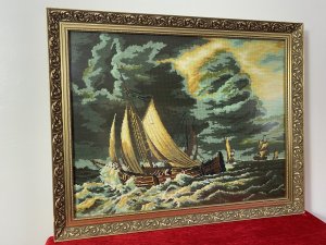 Large Maritime Handwoven Wool Work Tapestry Masterpiece Of Sailing Ships Upon Stormy Sea Circa - Vintage 1960's Approx Composition - Wool Work Tapestry Listing Description Stunning Hand Woven Wool Work Tapestry Of Five Large Wooden Masted Sailing Ships On Stormy Sea. The Maker Has Captured The Aggressive Movement Of The Waves With An Array Of Deep Blue, Kharki Green And White Hues As The Waves Break Up On The Side Of The Closest Vessel. The Largest Ship Passes By Another Vessel, You Can Just See The Masts Behind, Whilst Three Sailing Ships Approach From The Distance. A Wonderful Sky Display Filled With Lightening Strikes And Dark Clouds. Beautiful Handwoven Maritime Collectors Piece Set In Ornate Floral Filigree Gilt Wood Frame. Fine Art Gallery Upon The Back. Unsigned. Dimensions In Inches Height 23 1/4" Width29"