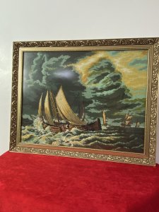 Large Maritime Handwoven Wool Work Tapestry Masterpiece Of Sailing Ships Upon Stormy Sea Circa - Vintage 1960's Approx Composition - Wool Work Tapestry Listing Description Stunning Hand Woven Wool Work Tapestry Of Five Large Wooden Masted Sailing Ships On Stormy Sea. The Maker Has Captured The Aggressive Movement Of The Waves With An Array Of Deep Blue, Kharki Green And White Hues As The Waves Break Up On The Side Of The Closest Vessel. The Largest Ship Passes By Another Vessel, You Can Just See The Masts Behind, Whilst Three Sailing Ships Approach From The Distance. A Wonderful Sky Display Filled With Lightening Strikes And Dark Clouds. Beautiful Handwoven Maritime Collectors Piece Set In Ornate Floral Filigree Gilt Wood Frame. Fine Art Gallery Upon The Back. Unsigned. Dimensions In Inches Height 23 1/4" Width29"