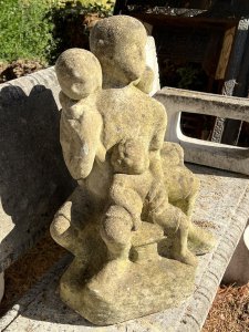Modernistic Henri Moore Style 'Family Heirloom Portrait ' Garden Statue Circa - Vintage Composition - Reconstituted Stone Listing Description Rare Modernistic Garden Sculpture In The Henri Moore Style, Depicting A Family Portrait With Central Mother And Father Figures, A Young Boy Leans Back Onto His Fathers Lap With Open Arms, The Mother Has Young Infant Standing Upon Her Knee, Young Daughter Stands Upon The Chair Between Her Fathers Knees. Unusual Subject With Interesting Form. Wonderful Statue For Family Garden. Lovely Size Too! Dimensions in Inches Height 21" Width 17" Depth 15"