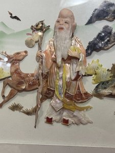 Oriental Chinese LAO SHOUXIN Deity Of Longevity Mother Of Pearl Artwork Signed Circa - 20th Century Composition - Mother of Pearl Listing Description Fine Antique Artwork Of Oriental Chinese LAO SHOUXIN Deity Of Longevity Central Of Oriental Landscape. Artwork Hand Crafted In Mother of Pearl And Precious Shell Formations With Finely Detailed Hand Painted Features. Showpiece Set Inside Glazed Black Lacquered Display Case And Signed By Artist. Dimensions In Inches Height 12" X Width 18 3/4"